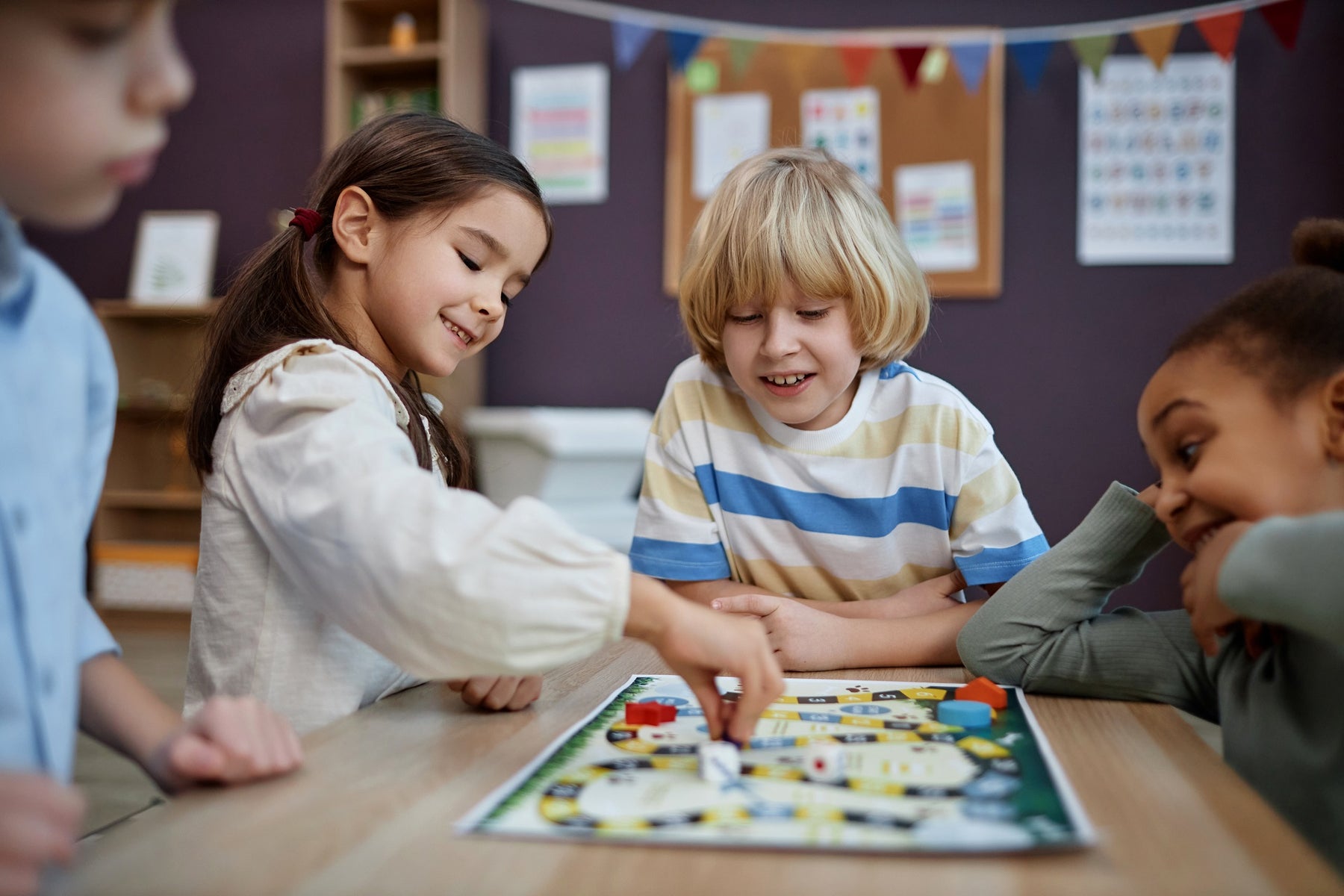 Play and Progress: How Board Games Foster Children's Foundation Skills