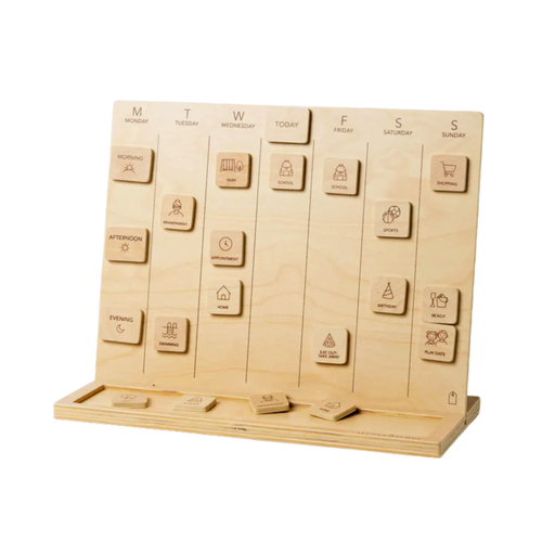 Wooden visual schedule board with days of the week and movable tiles showing daily activities arranged on a stand on a white surface.