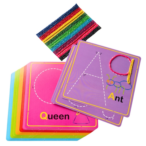 Colorful children's learning cards and a striped fabric Wikki Stix laid out on a white surface. The cards show educational shapes and words such as Queen, Ant, and A, with bright pink, purple, green, blue, yellow, and orange tones.